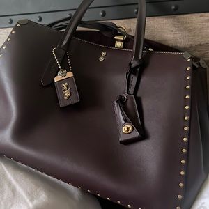we are selling this coach handbag for one’s interested in designer.